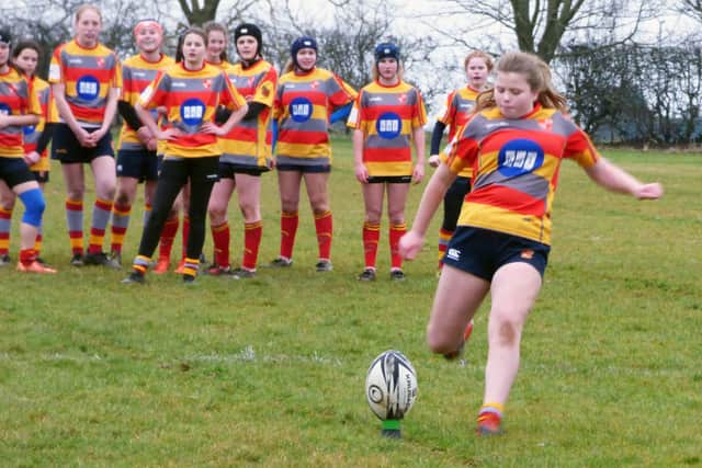 Rose Smith kicking one of her nine conversions for Borough Under 15s last weekend.