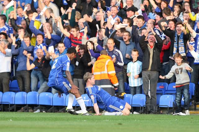 Grant McCann celebrates his goal for Posh against MK Dons in the League One play-off semi-final against MK Dons at London Road in May, 2011.