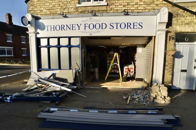 Wreckage outside Thorney Food Stores on Wisbech Road, Thorney.