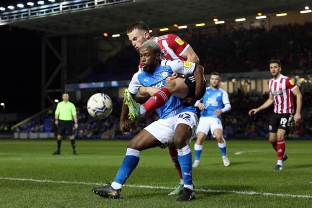 Leando Fuchs of Peterborough United battles for the ball against Sheffield United.  Photo: Joe Dent/theposh.com.