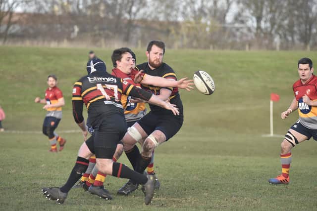 Zak McClure of Borough gets his pass away against West Bridgeford. Photo: David Lowndes.
