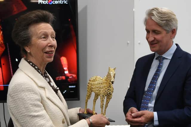 Princess Anne receives a gift of a model horse made by 3D printing from Photocentric managing director Paul Holt last year. EMN-210920-142643009