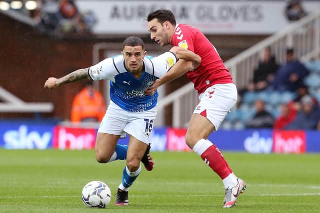 Oliver Norburn in action for Posh