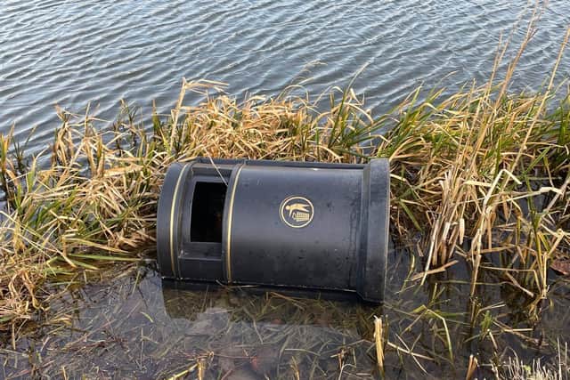 Two bins were thrown into the lake at Cuckoos Hollow.