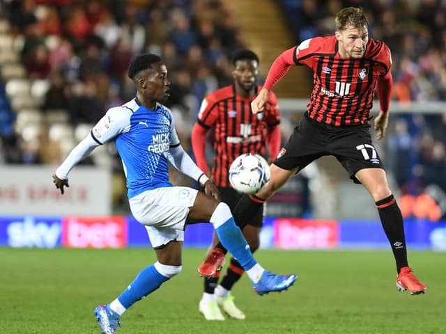 Siriki Dembele in action for Posh against Bournemouth in March.