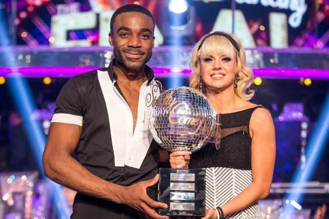 Ore Oduba and Joanne Clifton with the glitterball trophy after they won the final of the BBC1 show Strictly Come Dancing