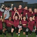 The Hampton Gardens year seven side celebrate their cup final win. Photo: David Lowndes.