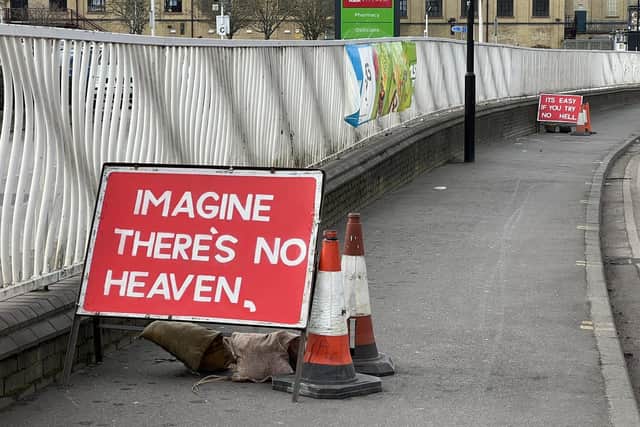 The John Lennon signs on Bourges Boulevard. Photo: Nick Reinis-Keightley.
