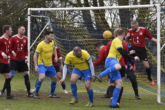 Action from Sawtry (yellow) v Tydd Reserves. Photo: David Lowndes.