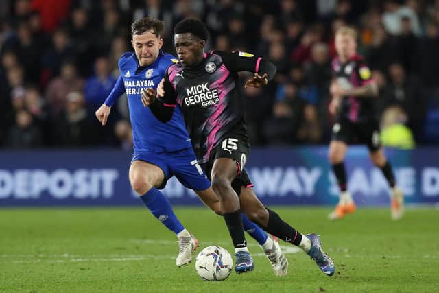Kwame Poku of Peterborough United in action against Cardiff City. Photo: Joe Dent/theposh.com.
