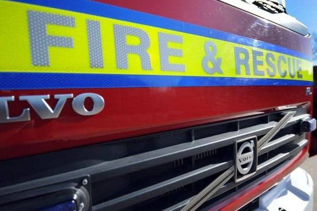One woman was rescued by fire crews