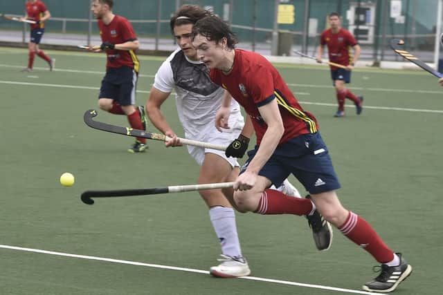 Matt Goodley (red) scored for City of Peterborough at Olton & West Warwicks.