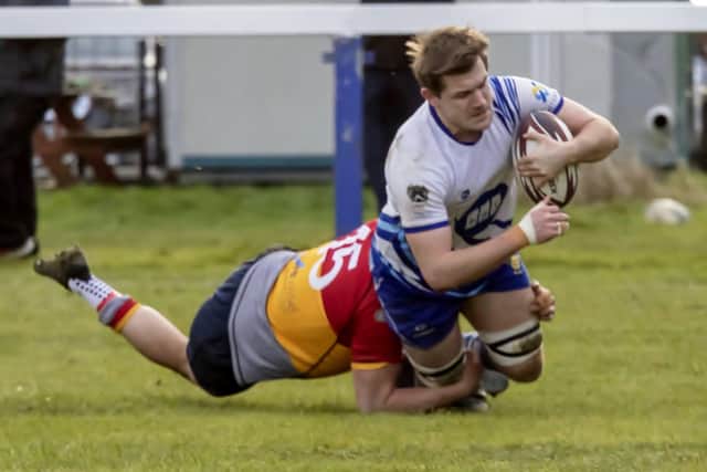 Charles Pendlebury touches down for Peterborough Lions against Peterborough RUFC. Photo: Mick Sutterby.