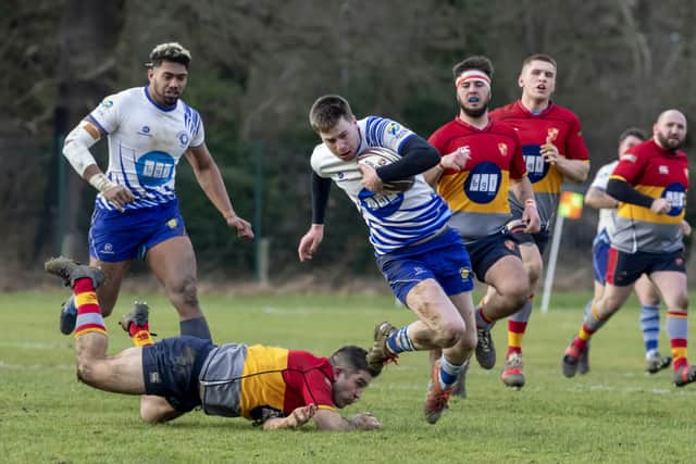 Thomas Johnson is on  his way to a try for Peterborough Lions against Peterborough RUFC. Photo: Mick Sutterby.