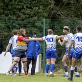 Potential aggro averted at the Peterborough Lions (white) v Peterborough RUFC  game. Photo: Mick Sutterby.
