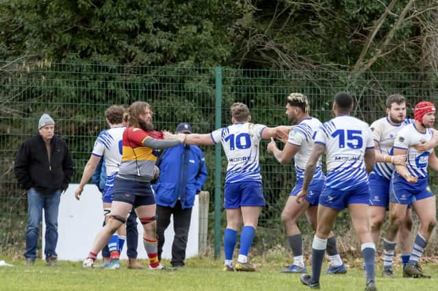 Potential aggro averted at the Peterborough Lions (white) v Peterborough RUFC  game. Photo: Mick Sutterby.