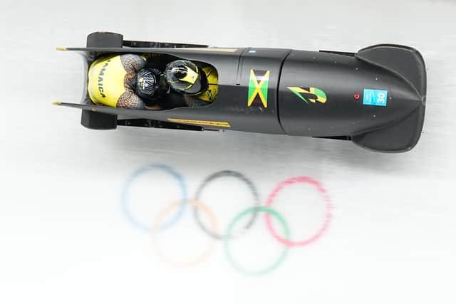Jamaica's Shanwayne Stephens and Nimroy Turgottduring day eleven of the Beijing 2022 Winter Olympic Games at the Yanqing National Sliding Centre in China. Picture date: Tuesday February 15, 2022. EMN-220215-152247005