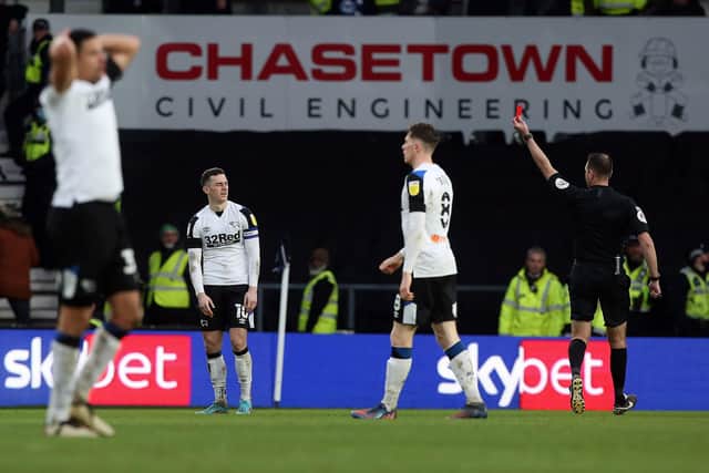 Tom Lawrence of Derby County is shown a straight red card. Photo: Joe Dent.