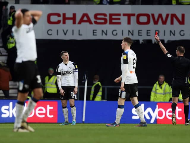 Tom Lawrence of Derby County is shown a straight red card. Photo: Joe Dent.