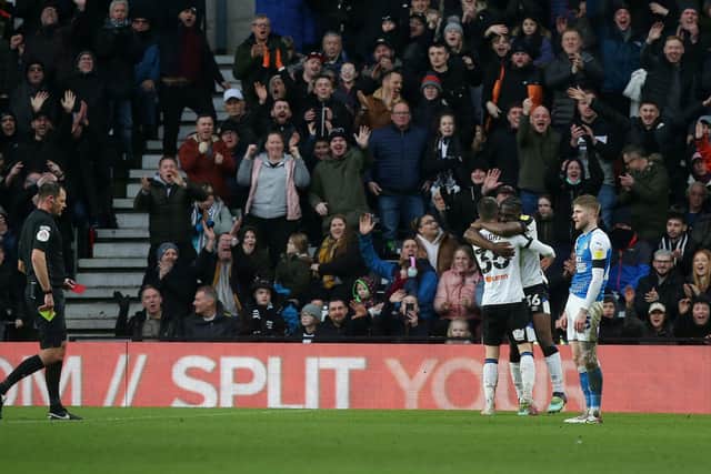 Hayden Coulson of Peterborough United is shown a second yellow card against Derby County. Photo: Joe Dent/theposh.com