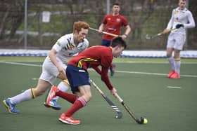 Ben Goold (red) in action from City of Peterborough against Nottingham University at Bretton Gate. Photo: David Lowndes.