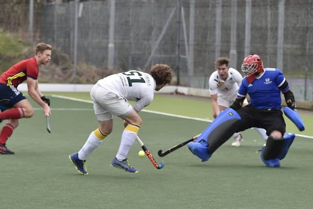 City of Peterborough goalkeeper Cameron Goodey is up against two Nottingham University forwards. Photo: David Lowndes.