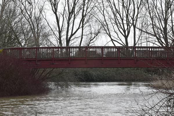 Footbridge over channel from River Nene to Thorpe Meadows. EMN-220221-142344009