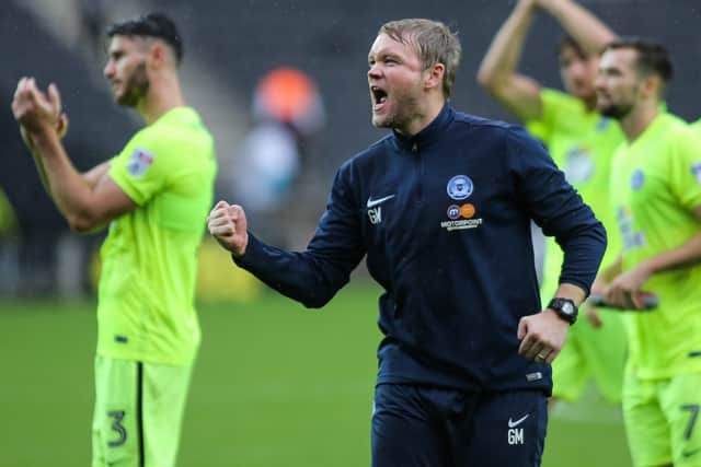 Grant McCann celebrates a Posh win in 2016.