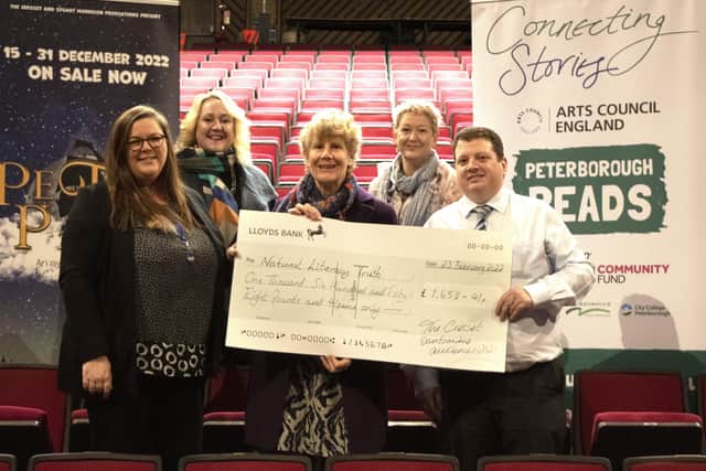 The cheque presentation to the National Literacy Trust