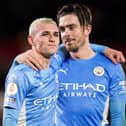Phil Foden and Jack Grealish celebrate victory over Brentford earlier this month. PA Wire/PA Images.