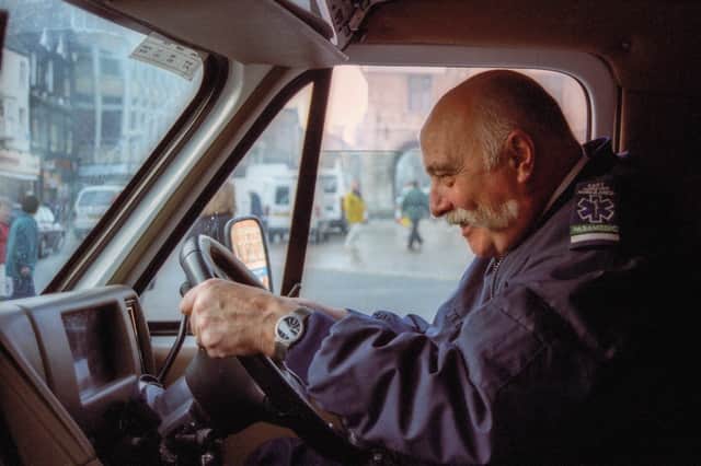 Tom Brazier pictured by Peterborough street photographer Chris Porsz in his ambulance in 1999.