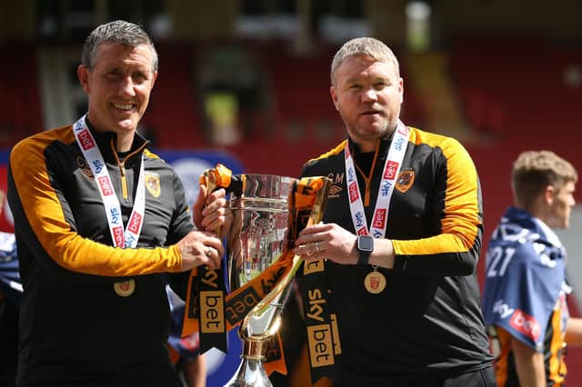 New Posh boss Grant McCann (right) and his assistant Cliff Byrne after winning the League One title with Hull City last season. Photo: Steve Paston/PA Wire
