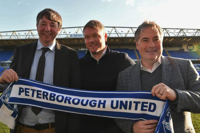 New Posh boss Grant McCann is flanked by co-owners Dr Jason Neale (left) and Stewart 'Randy' Thompson. Photo: David Lowndes.