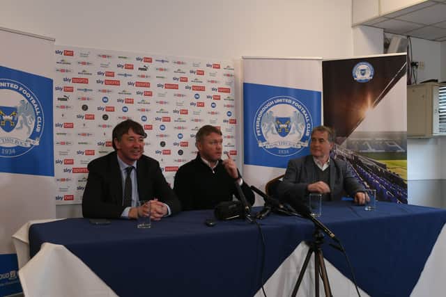 New Posh manager Grant McCann (centre) fielding questions from the press with co-owners Dr Jason Neale (left) and Stewart 'Randy' Thompson. Photo: David Lowndes.