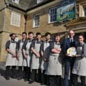 Lee Clarke (right) and his Prevost restaurant team at the Haycock Manor Hotel with their  Three Rosettes AA Award EMN-220225-162059009