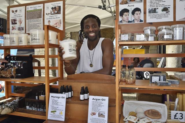 Vegan market on Cathedral Square. Mo Meshach at his Clean and Natural stand.