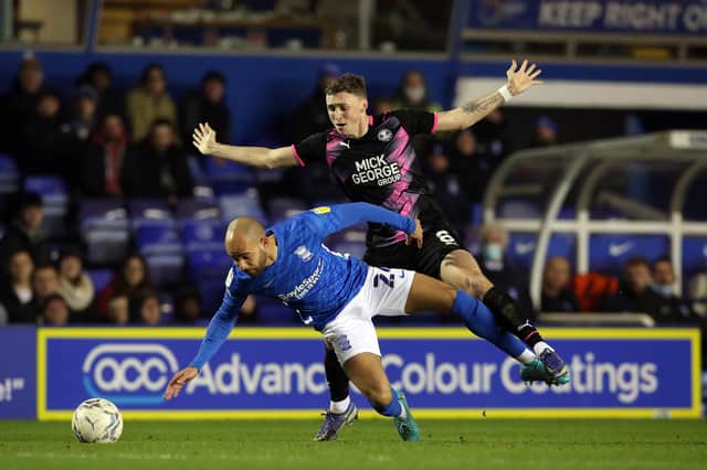 Jack Taylor (right) in action for Posh at Birmingham City in January. He hasn't played since this game.