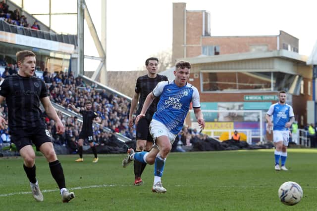 Harrison Burrows of Peterborough United in action against Hull City. Photo: Joe Dent/theposh.com.