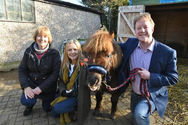 MP for Peterborough Paul Bristow at the NewArk adventure playground with farm manager Carolyn Bellamy and Cllr Jackie Allen. EMN-220225-162144009