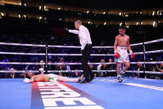 Karim Guerfi is down and out after receiving Jordan Gill's 'shot from the Gods.' Photo: Mark Robinson/Matchroom Boxing.