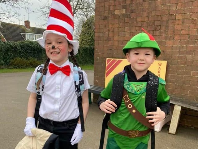 Freya dressed as Dr Seuss' Cat in the Hat and Ollie dressed as Peter Pan.