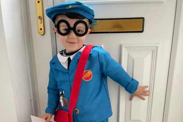Toby Wilkinson, aged 3, dressed a s Postman Pat.