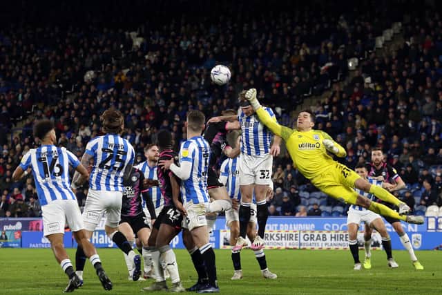 Goalmouth action between Peterborough United and Huddersfield Town. Photo: Joe Dent/theposh.com.