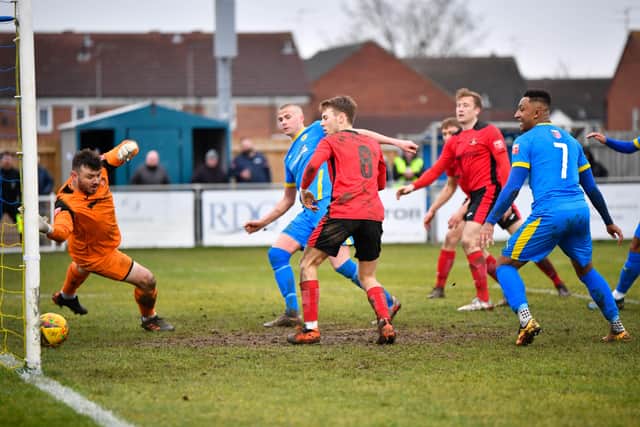 Brad McGowan scores for Peterborough Sports against Needham Market. Photo: James Richardson.