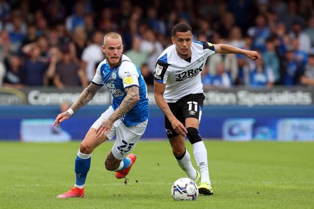 Derby's Ravel Morrison (right) in action against Posh's Joe Ward in August.