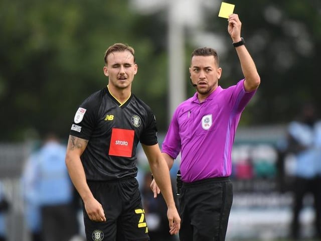 Referee Paul Howard shows a yellow card to Jack Diamond. Harrogate have had one player sent off this season.
Photo: Getty Images