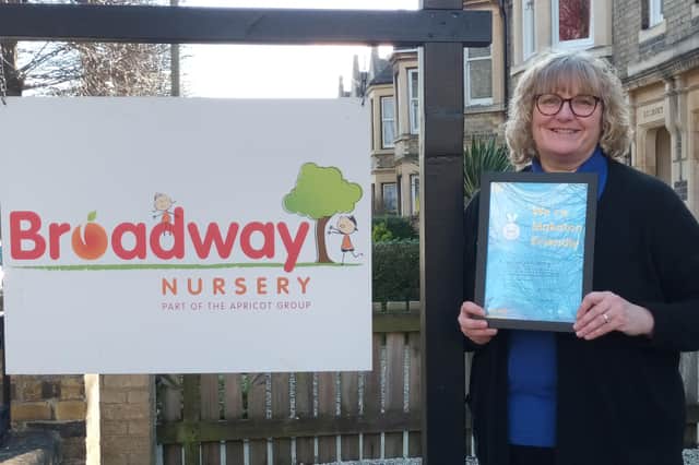 Broadway Nursery Manager, Deborah Cobb with the certificate.