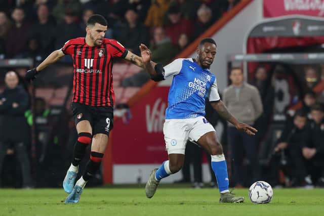 Jeando Fuchs of Peterborough United in action with Dominic Solanke of Bournemouth. Photo: Joe Dent/theposh.com.