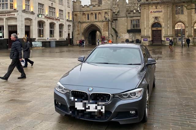 BMW parked in a pedestrianised area of Cathedral Square in Peterbrorugh city centre. (Photo courtesy of Toby Wood (@TobyWoody) on Twitter)