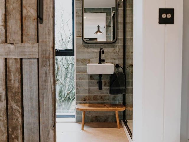 The bathroom includes a shower, toilet and sink - and bathroom toiletries are provided.